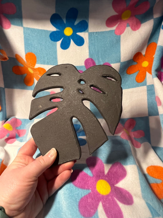 natural black clay monstera trivet