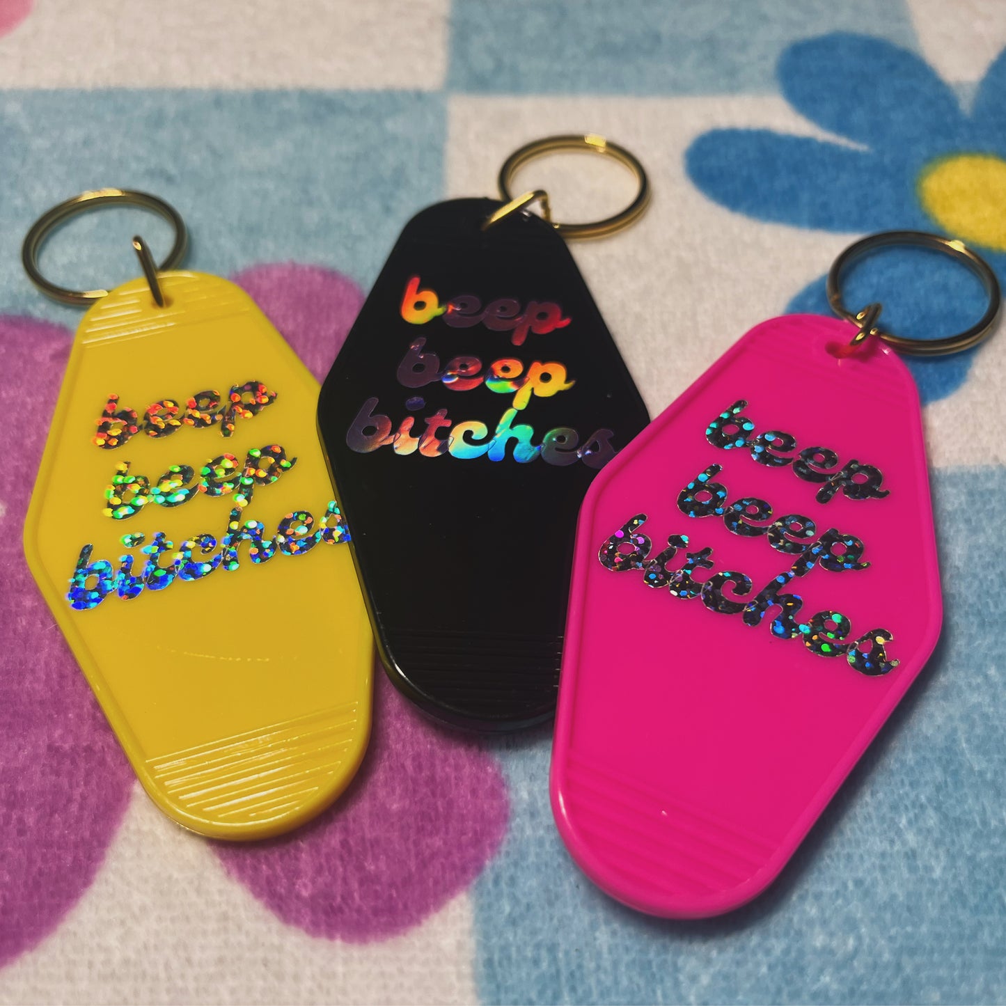 beep beep bitches motel keychain